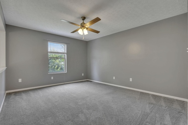 2375 Oakthorpe Dr, Hilliard, OH 43026 - carpeted empty room featuring a ceiling fan and a textured ceiling
