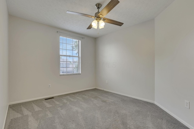 2375 Oakthorpe Dr, Hilliard, OH 43026 - carpeted empty room featuring a textured ceiling and a ceiling fan