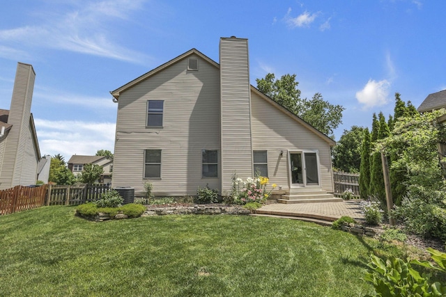 2375 Oakthorpe Dr, Hilliard, OH 43026 - rear view of property with a chimney and entry steps