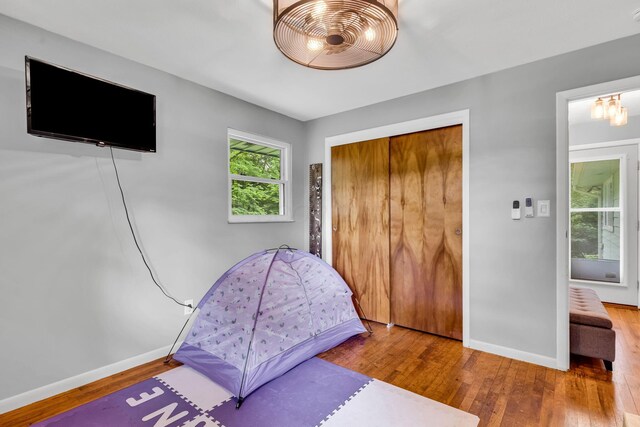 890 Elm Dr, Columbus, OH 43235 - bedroom with wood finished floors and a closet