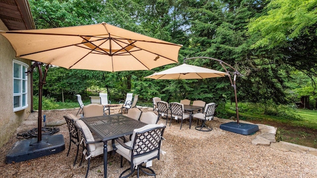 2830 Silver St, Granville, OH 43023 - view of patio featuring outdoor dining area and view of scattered trees