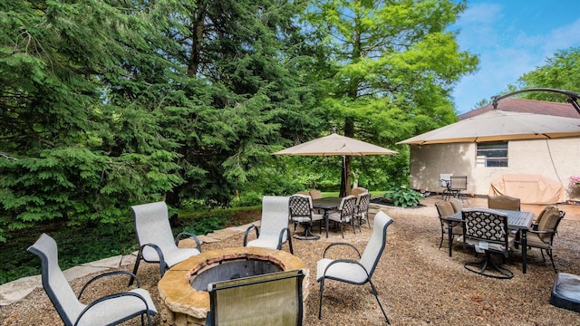 2830 Silver St, Granville, OH 43023 - view of patio featuring an outdoor fire pit and outdoor dining space
