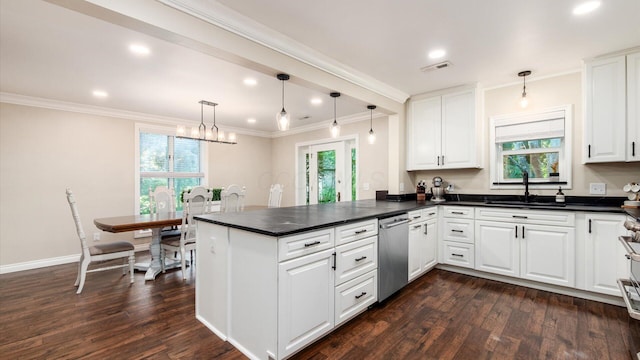 2830 Silver St, Granville, OH 43023 - kitchen with dishwasher, healthy amount of natural light, dark countertops, a peninsula, and crown molding