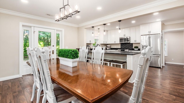 2830 Silver St, Granville, OH 43023 - dining space featuring dark wood-style flooring, ornamental molding, and recessed lighting