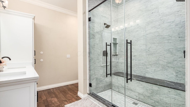 2830 Silver St, Granville, OH 43023 - full bathroom with crown molding, wood finished floors, a stall shower, and vanity