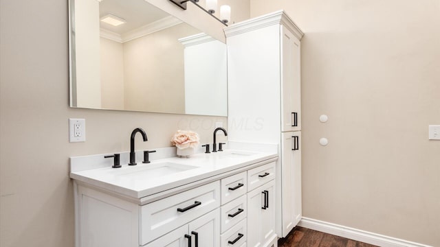 2830 Silver St, Granville, OH 43023 - full bathroom with crown molding, double vanity, and wood finished floors