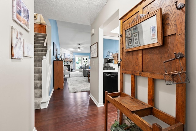 3903 Inverness Cir, Dublin, OH 43016 - entryway with a ceiling fan, dark wood finished floors, stairway, and a textured ceiling