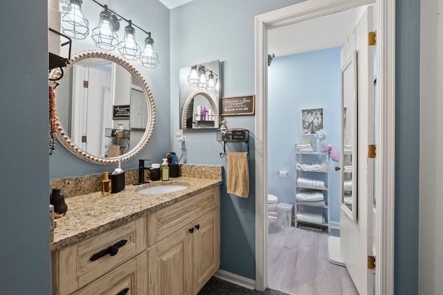 3903 Inverness Cir, Dublin, OH 43016 - bathroom featuring vanity and wood finished floors