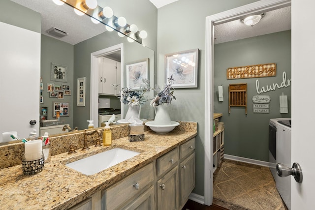 3903 Inverness Cir, Dublin, OH 43016 - bathroom featuring vanity and a textured ceiling