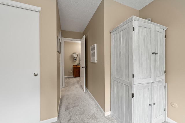 3903 Inverness Cir, Dublin, OH 43016 - hall with light colored carpet and a textured ceiling