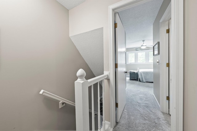 3903 Inverness Cir, Dublin, OH 43016 - corridor with an upstairs landing, carpet floors, and a textured ceiling