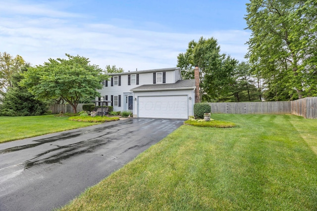 5681 Mcbride Ct, Dublin, OH 43016 - view of front of home with driveway and a chimney