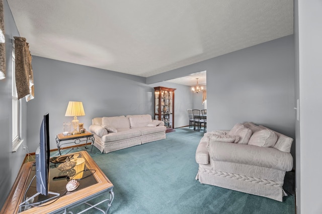 5681 Mcbride Ct, Dublin, OH 43016 - carpeted living room with a chandelier