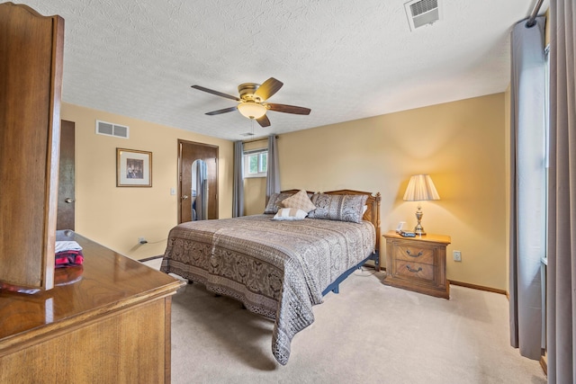 5681 Mcbride Ct, Dublin, OH 43016 - bedroom featuring light carpet, ceiling fan, and a textured ceiling