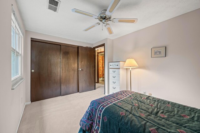 5681 Mcbride Ct, Dublin, OH 43016 - bedroom with carpet flooring, a closet, and ceiling fan