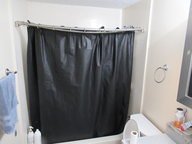 1881 Brimfield Rd, Columbus, OH 43229 - full bathroom featuring shower / bath combo with shower curtain