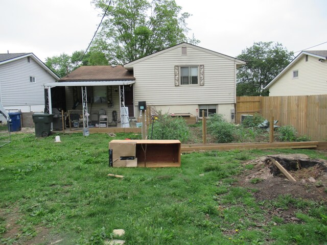 1881 Brimfield Rd, Columbus, OH 43229 - back of house featuring a garden