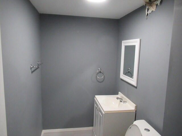 1881 Brimfield Rd, Columbus, OH 43229 - half bathroom featuring vanity and toilet