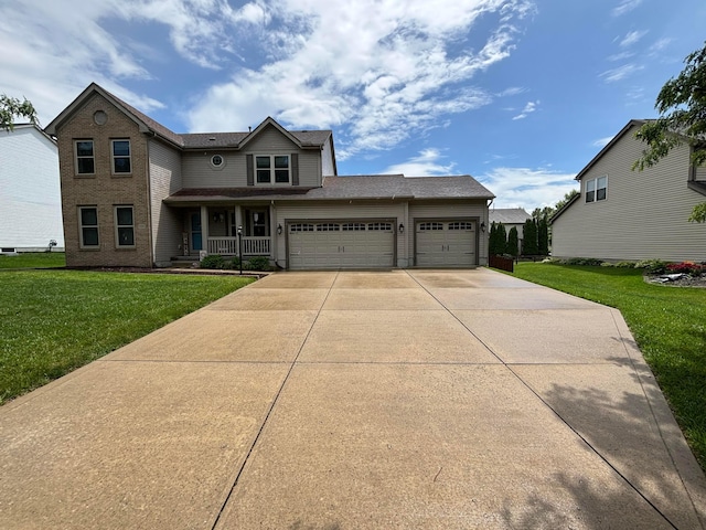 731 Manchester Dr, Pickerington, OH 43147 - traditional-style home featuring covered porch, a front lawn, an attached garage, and concrete driveway