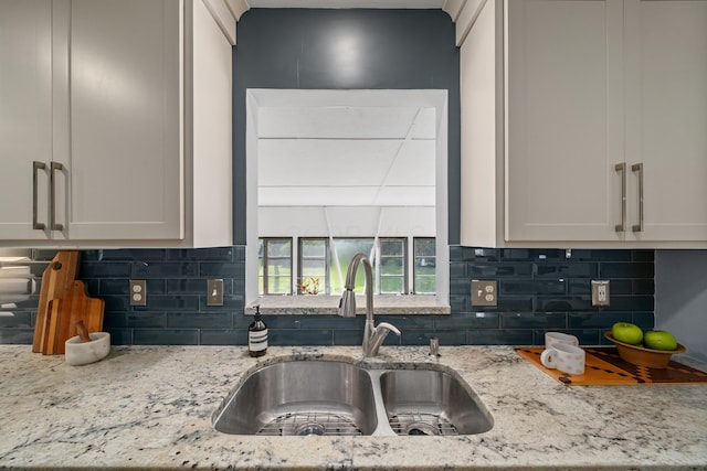 3287 Leighton Rd, Columbus, OH 43221 - kitchen featuring light stone counters and decorative backsplash