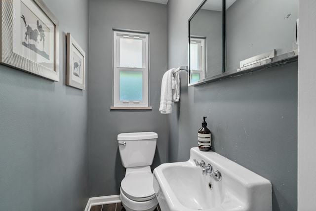 3287 Leighton Rd, Columbus, OH 43221 - bathroom featuring toilet and baseboards