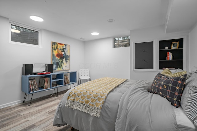 3287 Leighton Rd, Columbus, OH 43221 - bedroom with wood finished floors and recessed lighting