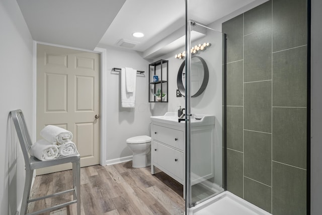 3287 Leighton Rd, Columbus, OH 43221 - bathroom featuring vanity, a stall shower, and wood finished floors