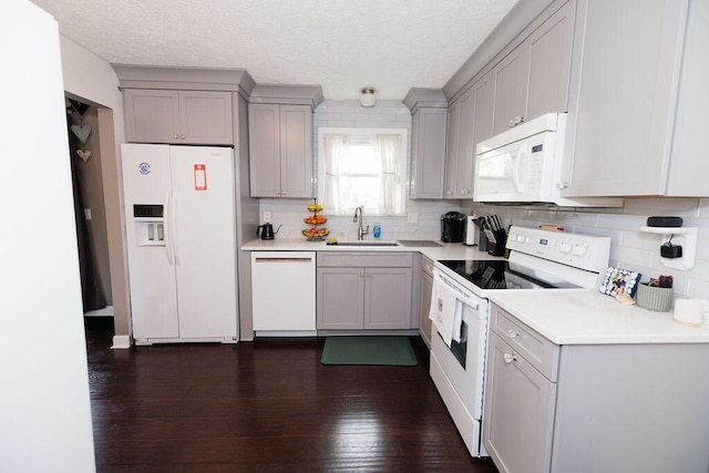 3790 Hunting Ln, Columbus, OH 43230 - kitchen featuring white appliances, gray cabinets, tasteful backsplash, light countertops, and a textured ceiling