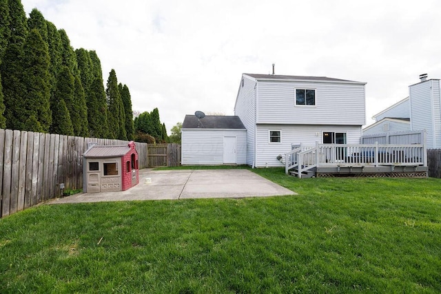 3790 Hunting Ln, Columbus, OH 43230 - rear view of house with a patio, a fenced backyard, a wooden deck, and a storage shed