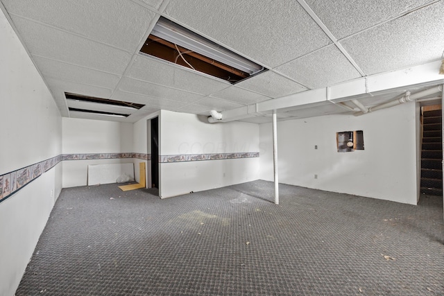 1716 Homer Rd NW, Utica, OH 43080 - finished basement with a paneled ceiling and carpet floors