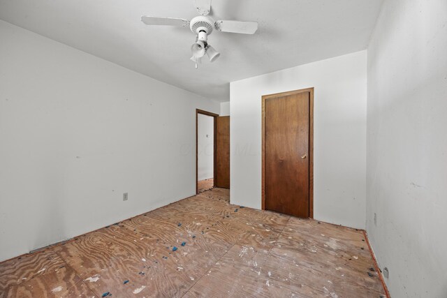1716 Homer Rd NW, Utica, OH 43080 - unfurnished bedroom featuring a closet and ceiling fan