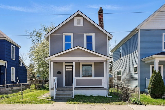 743 Reinhard Ave, Columbus, OH 43206 - american foursquare style home with covered porch and a chimney