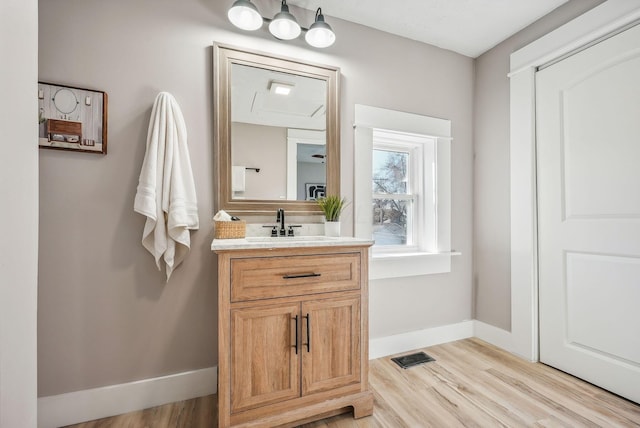 743 Reinhard Ave, Columbus, OH 43206 - bathroom with wood finished floors and vanity