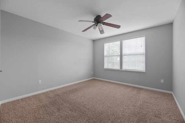 8101 Orange Station Loop, Lewis Center, OH 43035 - carpeted spare room featuring a ceiling fan and baseboards