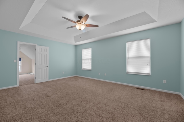 8101 Orange Station Loop, Lewis Center, OH 43035 - spare room with a tray ceiling, a ceiling fan, and carpet flooring