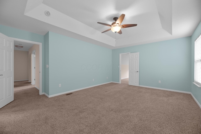 8101 Orange Station Loop, Lewis Center, OH 43035 - carpeted empty room featuring a raised ceiling and ceiling fan