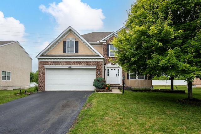 8101 Orange Station Loop, Lewis Center, OH 43035 - traditional home featuring driveway, brick siding, a front yard, and a garage