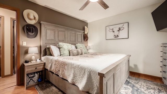 637 Livingston Ct, Heath, OH 43056 - bedroom with light wood finished floors and ceiling fan