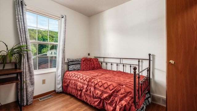 637 Livingston Ct, Heath, OH 43056 - bedroom featuring wood finished floors and baseboards
