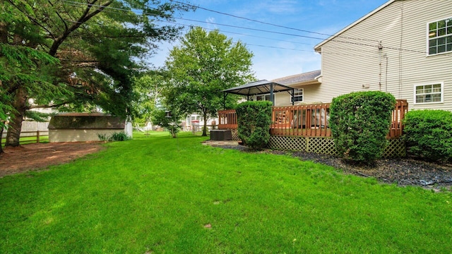 637 Livingston Ct, Heath, OH 43056 - view of grassy yard with a gazebo, a wooden deck, and an outbuilding