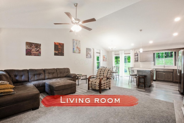2499 Apple Valley Dr, Howard, OH 43028 - living room featuring recessed lighting, light wood finished floors, vaulted ceiling, and ceiling fan