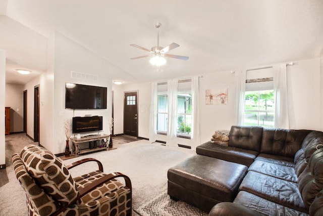 2499 Apple Valley Dr, Howard, OH 43028 - carpeted living area featuring a ceiling fan and high vaulted ceiling