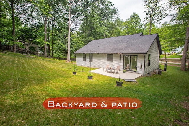 2499 Apple Valley Dr, Howard, OH 43028 - back of house with a lawn, a patio area, and roof with shingles