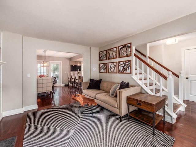 1243 Harrison Ave, Columbus, OH 43201 - living room featuring hardwood / wood-style floors and stairs