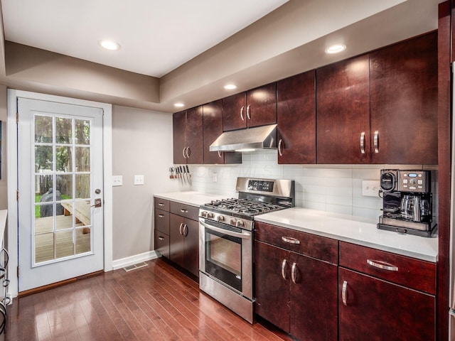 1243 Harrison Ave, Columbus, OH 43201 - kitchen with exhaust hood, gas stove, light countertops, decorative backsplash, and recessed lighting