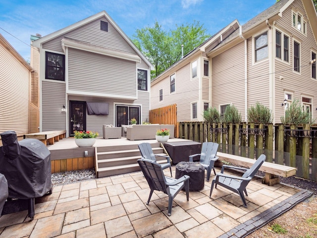 1243 Harrison Ave, Columbus, OH 43201 - view of patio featuring an outdoor living space with a fire pit, grilling area, and a wooden deck