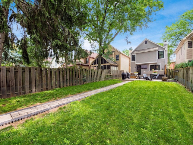 1243 Harrison Ave, Columbus, OH 43201 - fenced backyard featuring a patio area