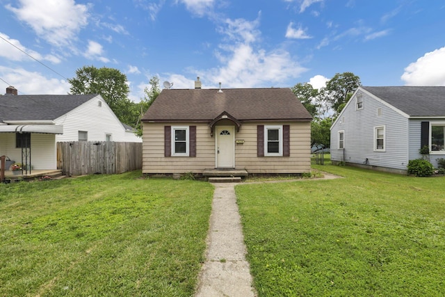 846 4th St, Lancaster, OH 43130 - bungalow-style house with a shingled roof and a chimney