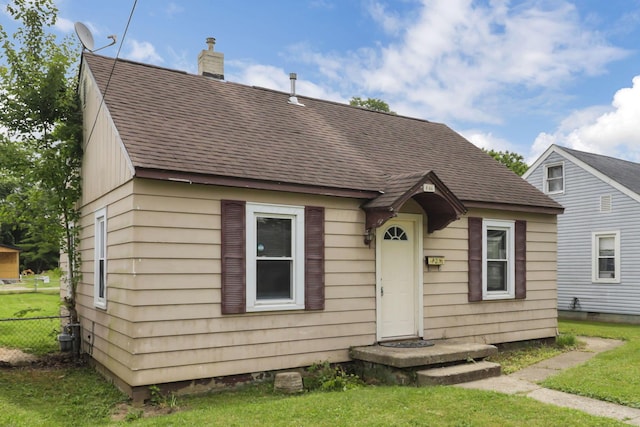 846 4th St, Lancaster, OH 43130 - view of front of home featuring a chimney and a shingled roof