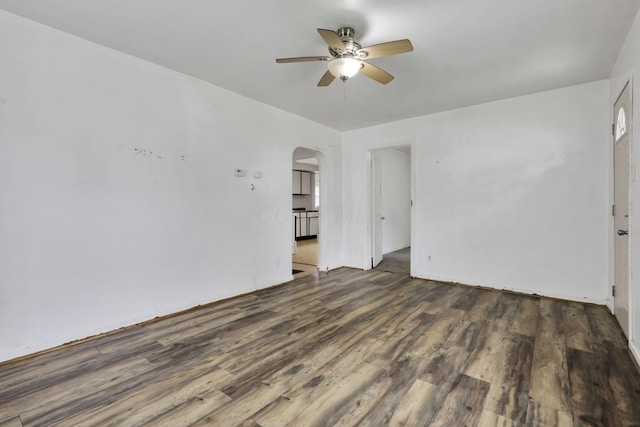 846 4th St, Lancaster, OH 43130 - unfurnished room featuring ceiling fan, arched walkways, and wood finished floors